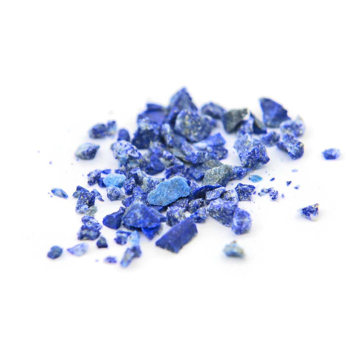 Loose lapis lazuli fragments on white